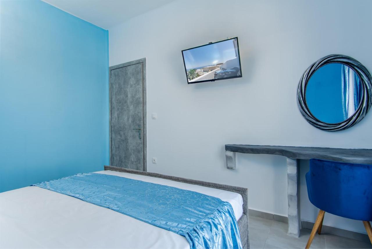 N Renieris Apartments ฟิรอสเตฟานี ภายนอก รูปภาพ